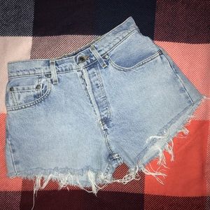 silver tab Levi’s distressed shorts